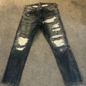Distressed Jeans by Jordan Craig